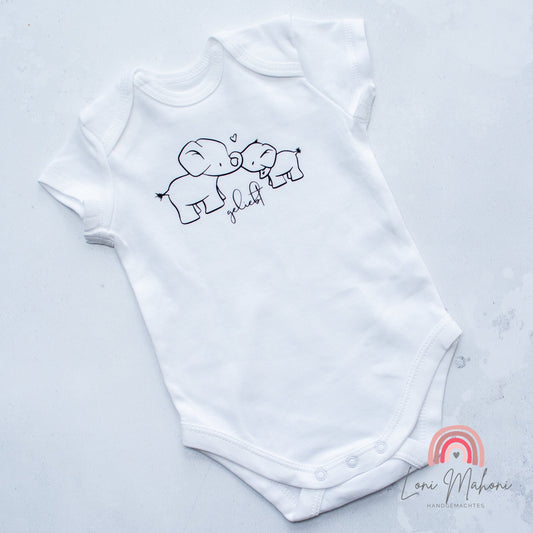 Babybody geliebt mit zwei Elefanten